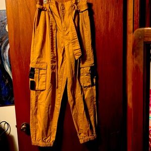 Orange/Red cargo pants.